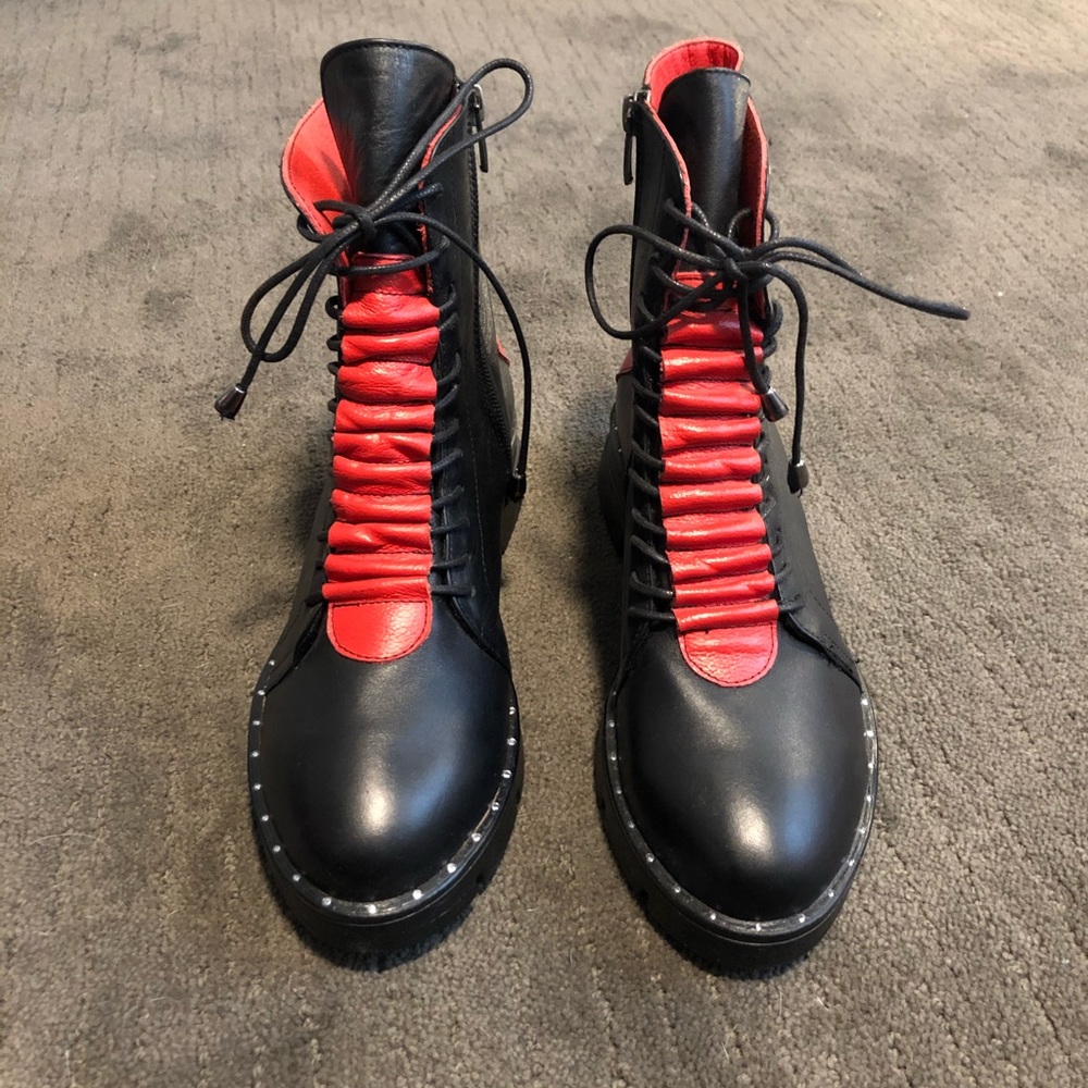 Black and red booties, lined with fur.